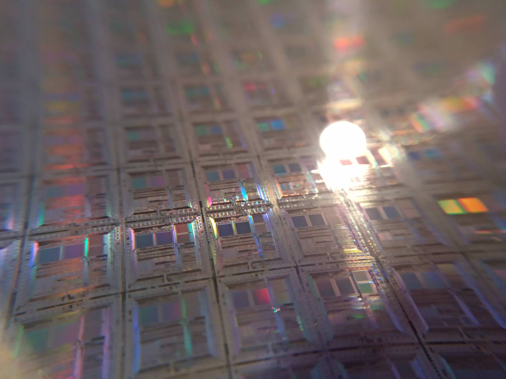 Repeating rectangular semiconductor dies on a real patterned silicon wafer